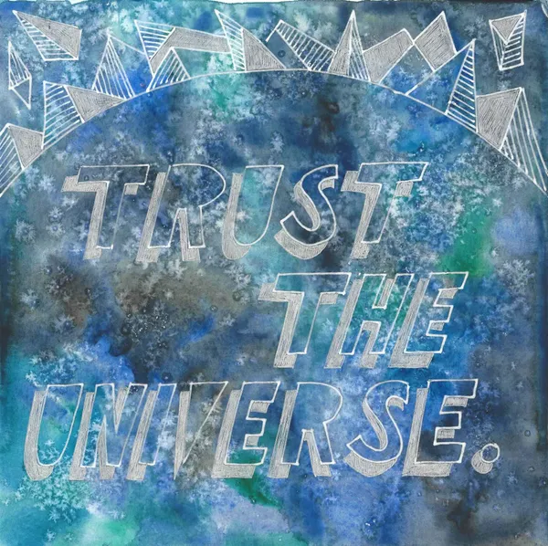 the words "TRUST THE UNIVERSE" and some patterning drawn in silver and white on a salted blue + teal watercolor background