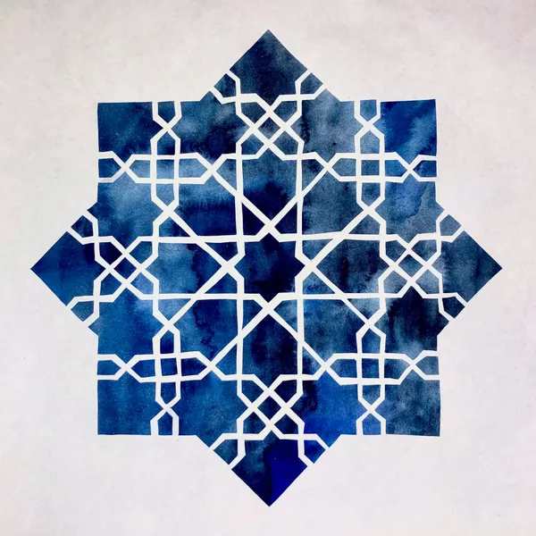 Islamic geometry design created with white paper on a navy blue watercolor background
