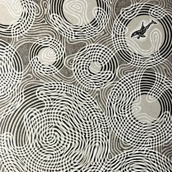 black and white wavy tiles on grey paper background, with a little orca in the top right