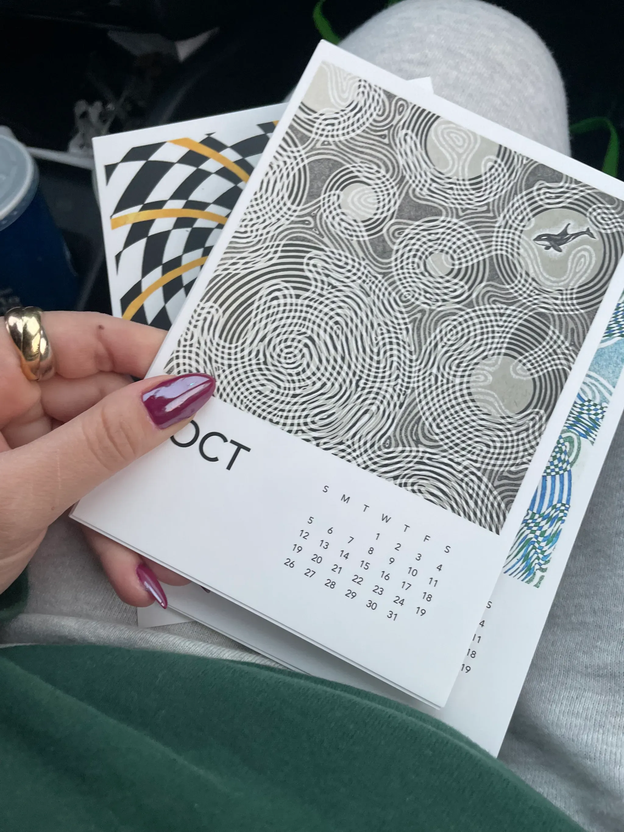 Reactions to my calendar, incl. J knowing I put my fave on October