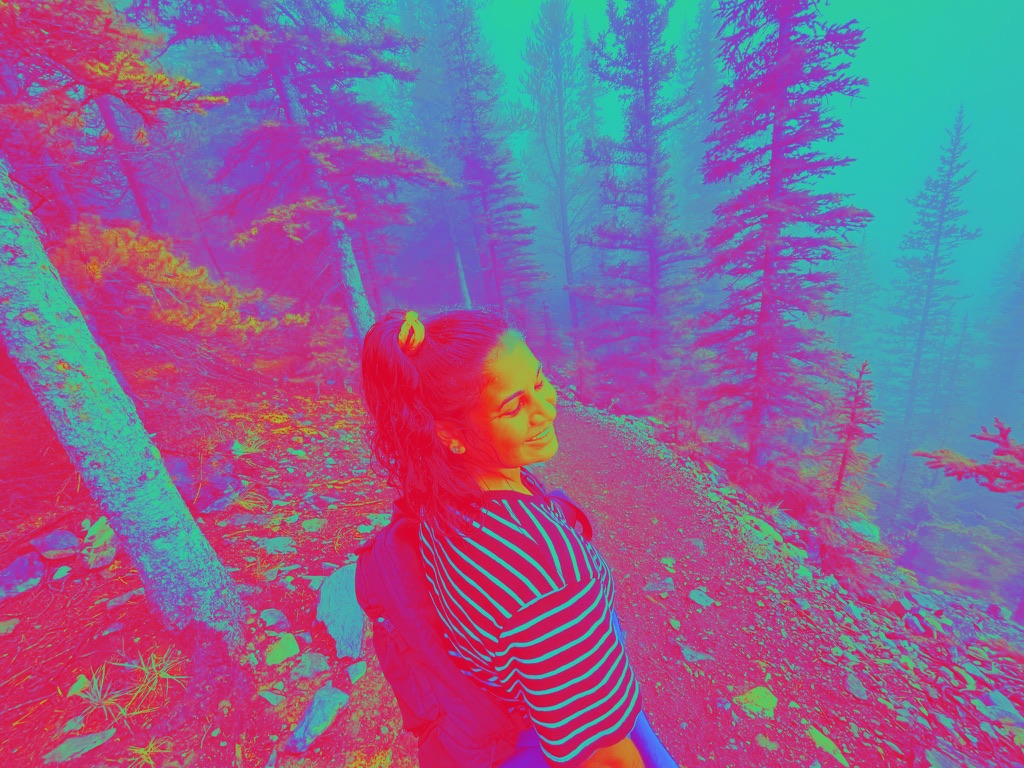 me in Banff, rainbow colored